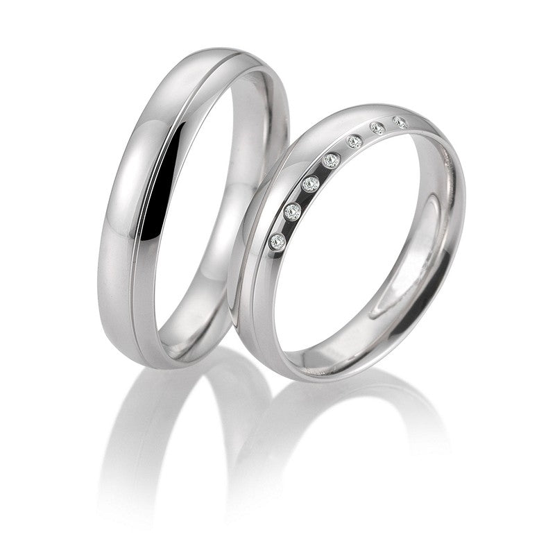 Luksuriøse Breuning vielsesringe i 9 eller 14 karat hvidguld med 0,039 ct diamanter i glat, blankt design.